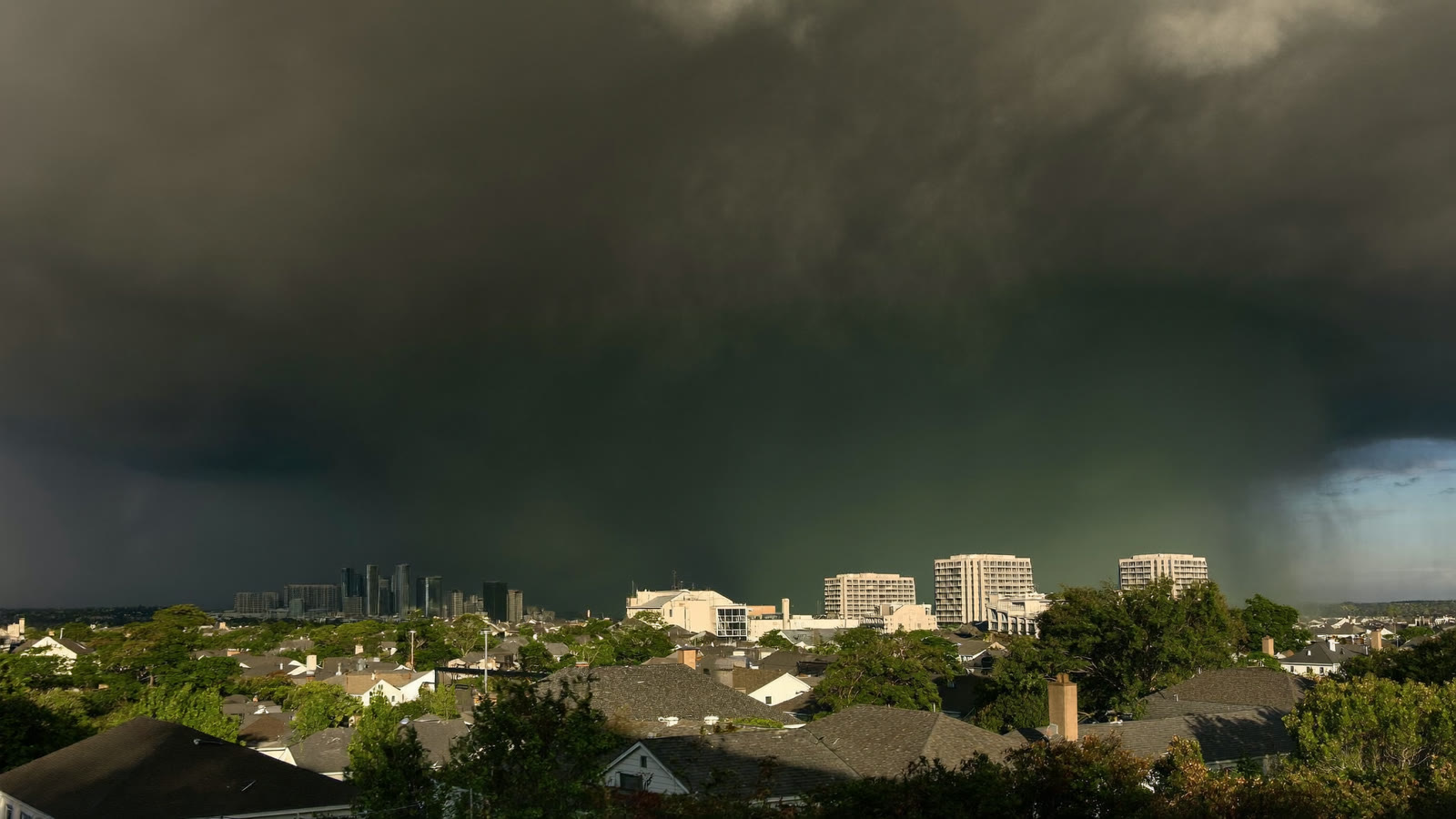 Dark storm front rolling in over a Missouri neighborhood